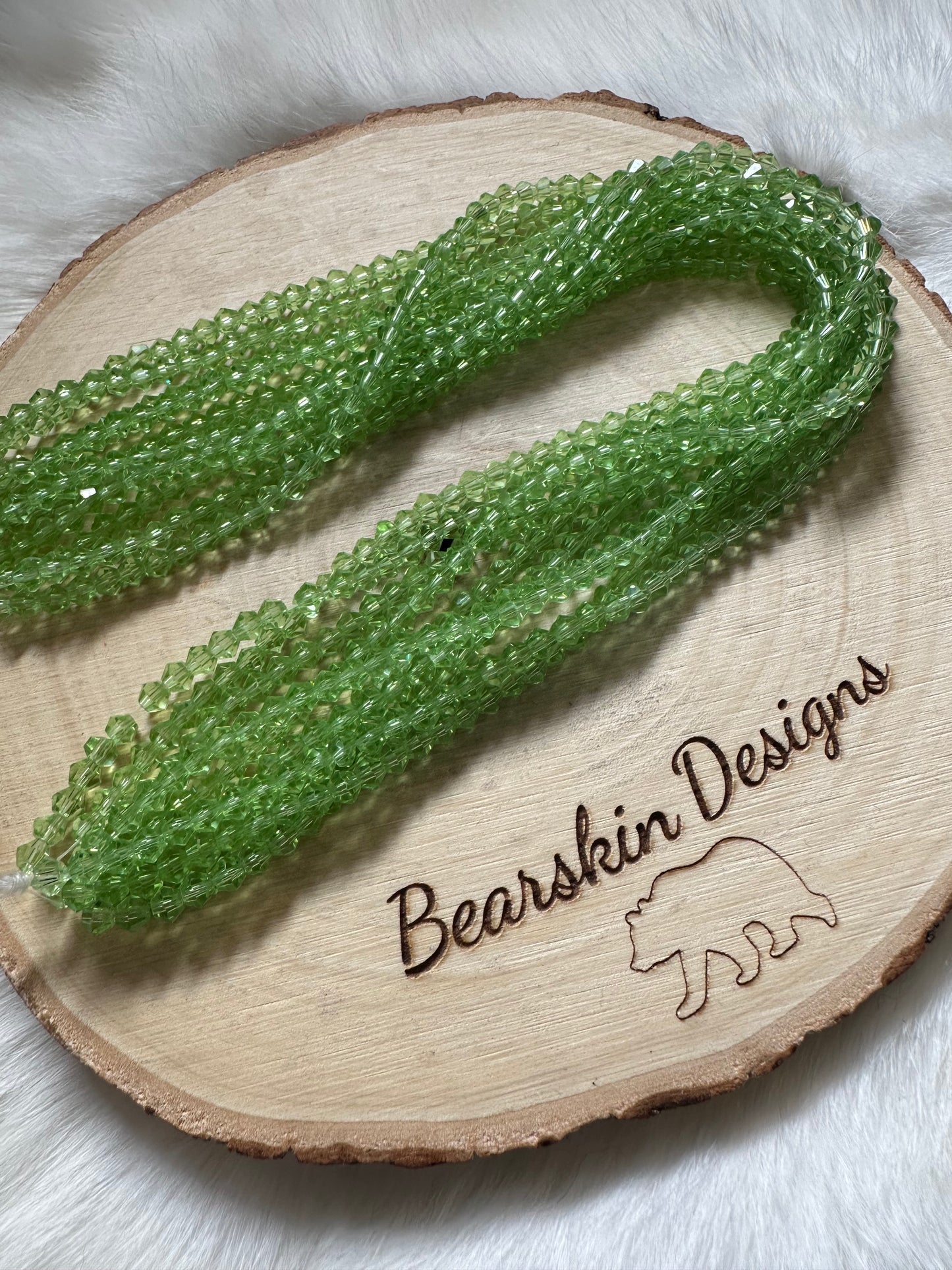 4mm Faceted Glass Crystal Bicones (1 strand/7g)