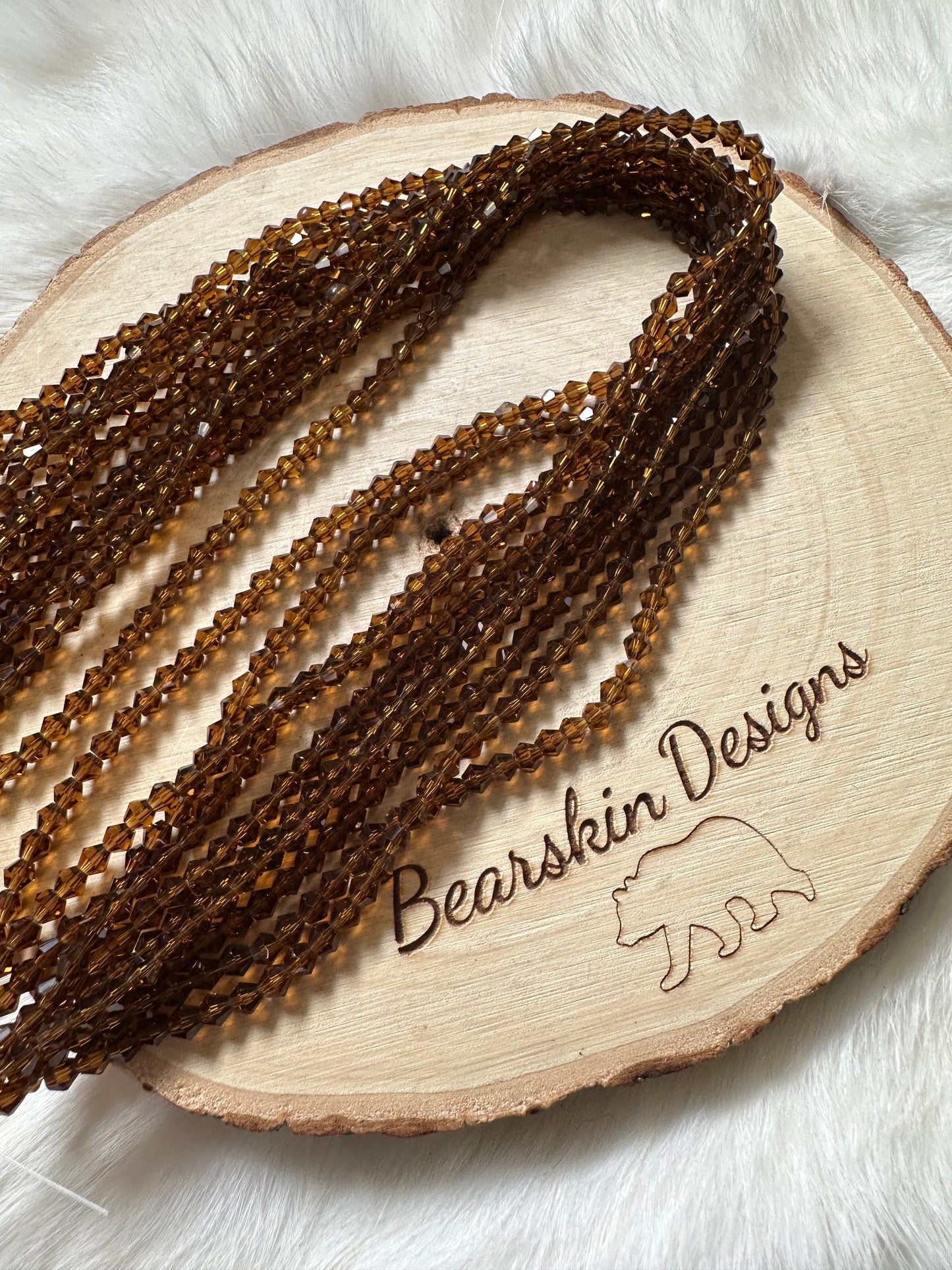 4mm Faceted Glass Crystal Bicones (1 strand/7g)
