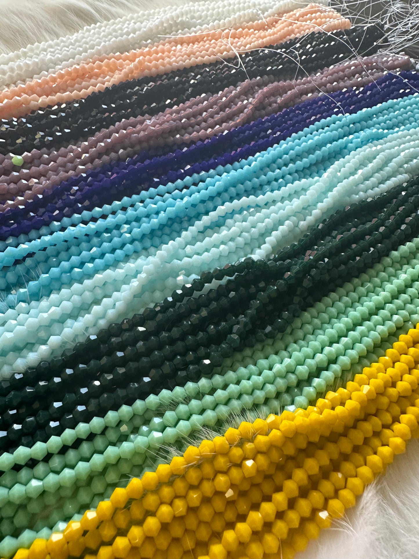 4mm Faceted Opaque Glass Bicones (1 strand/7.5g)